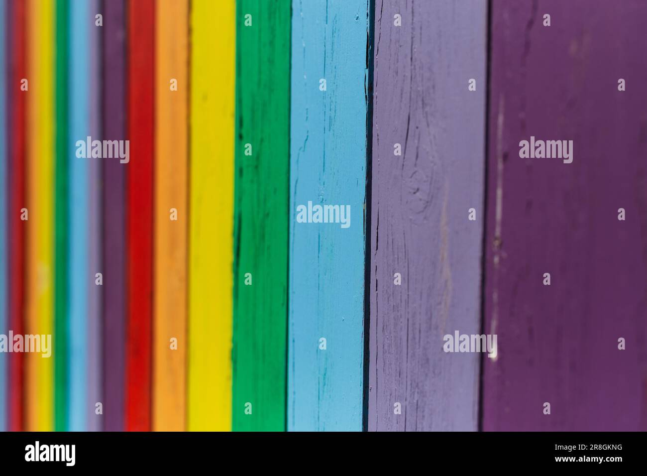 A old fence paint bright colors to make bold pattern. Stock Photo