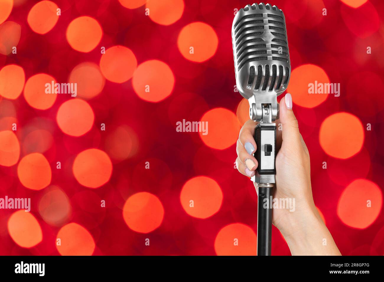Female singer bright red hi-res stock photography and images - Alamy