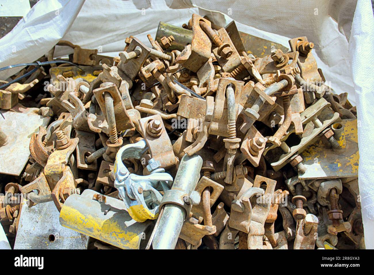 bags of scrap metal iron scaffolding parts Stock Photo