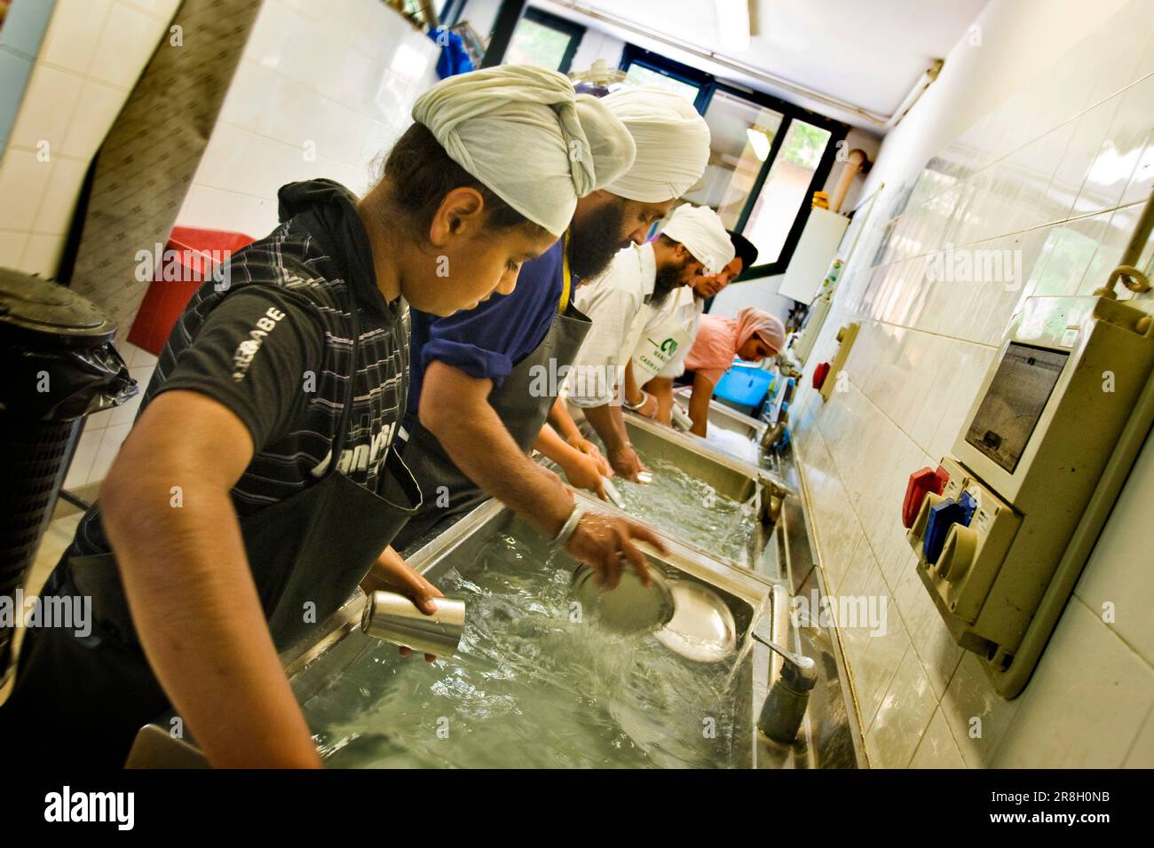 Dishwashers. Sikh community. Sikhdharma Gurdwara Singh Sabha