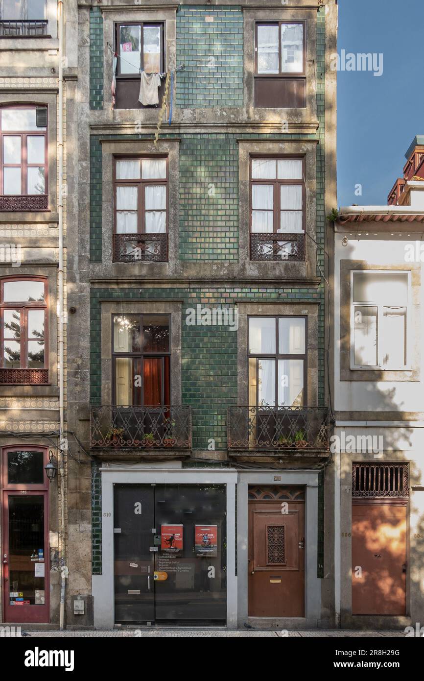 Porto, Portugal 24 April, 2023 Multistorey apartment and shop front