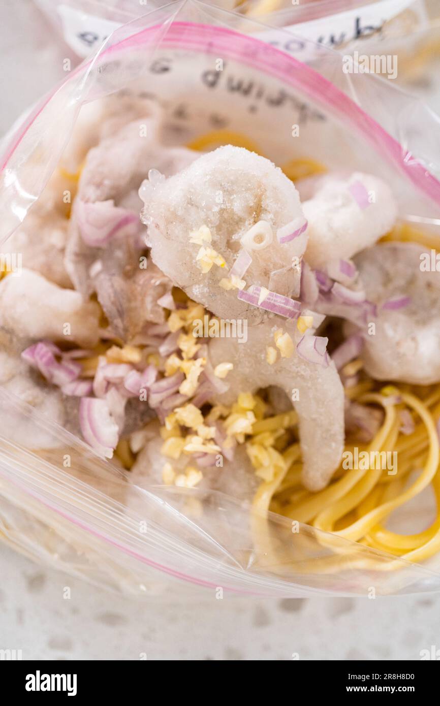 Frozen shrimp scampi meal prep Stock Photo - Alamy