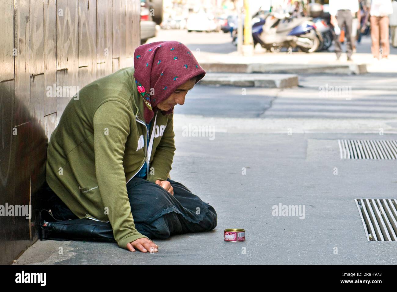 Beggar In Corso Buenos Aires. Milan. Lombardy. Italy Stock Photo