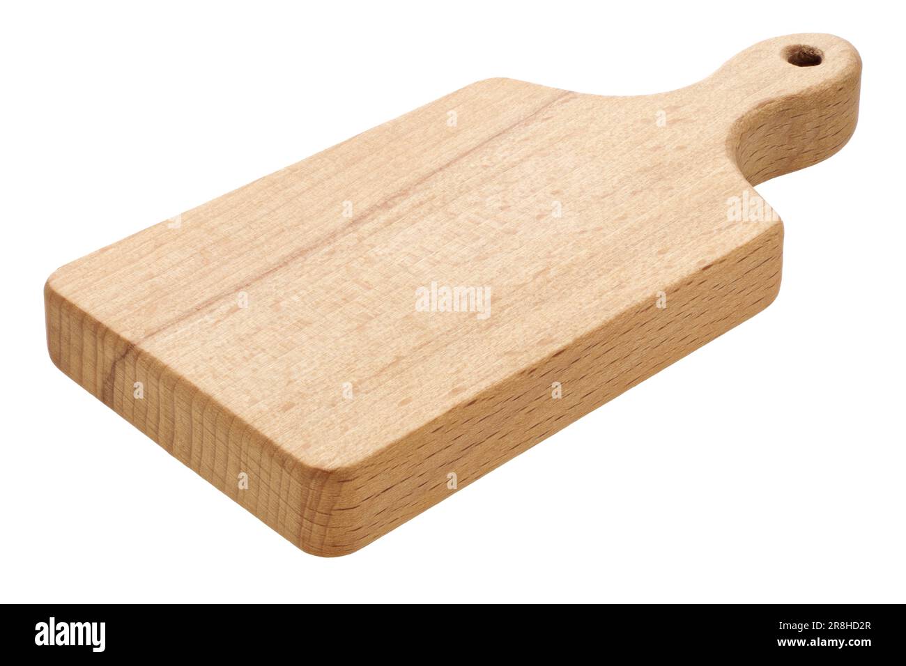 Traditional wooden cutting board, diagonal view, close-up shot, isolated on white background Stock Photo