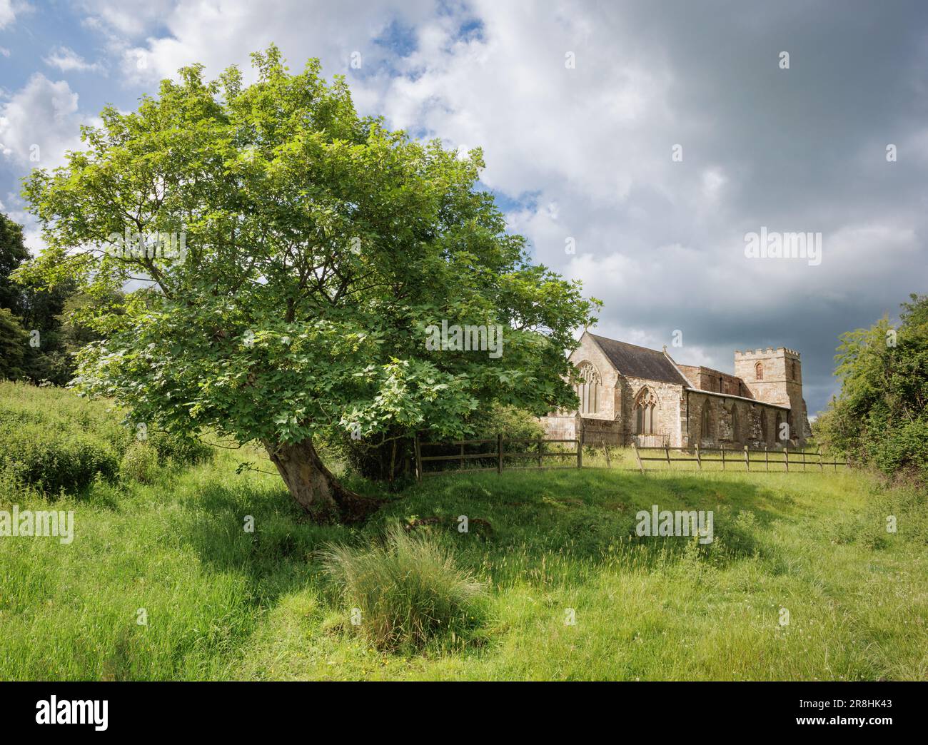 Wolfhamcote, Warwickshire - June 2023: The redundant church of St. Peter's stands alone, the sole extant building of the vanished Wolfhamcote village. Stock Photo