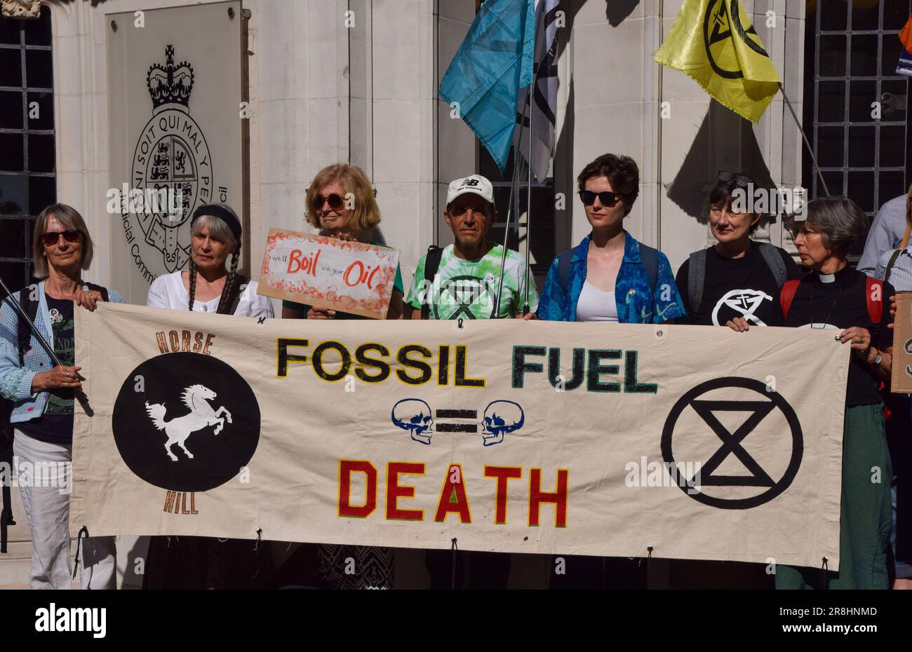 London, UK. 21st June 2023. Climate activists gather outside the Supreme Court in Westminster as legal action begins to prevent oil drilling at Horse Hill near Gatwick. Stock Photo
