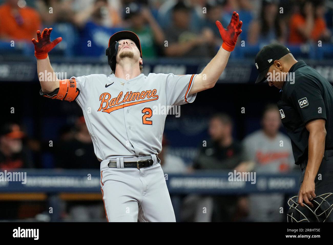 Baltimore Orioles' Gunnar Henderson (2) reacts after his solo home