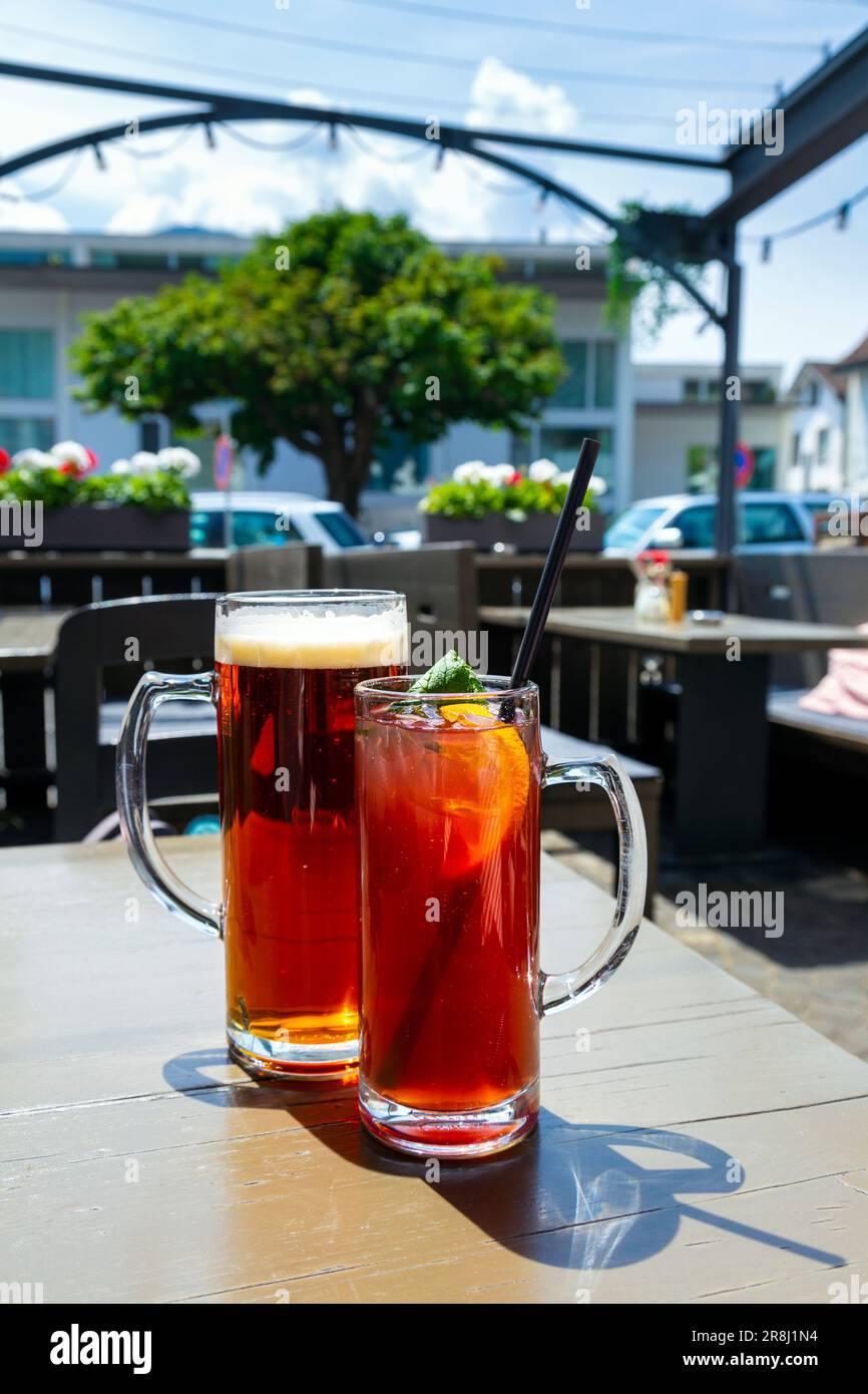 Beer and ice tea at Stadthaus restaurant, Unterseen, Switzerland Stock Photo