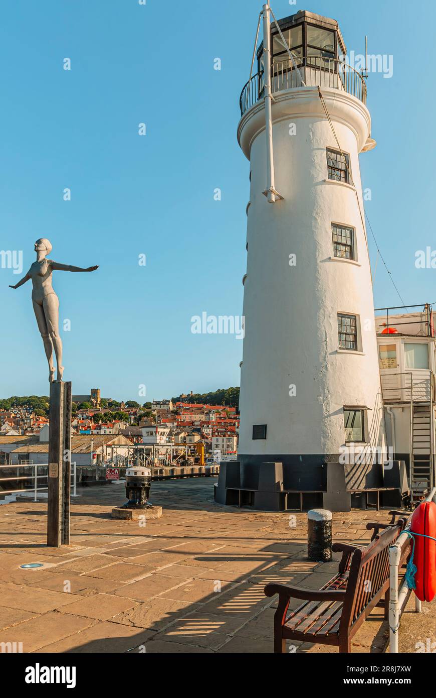 The Diving Belle Sculpture next to the Scarborough Light House, North Yorkshire, England, UK Stock Photo