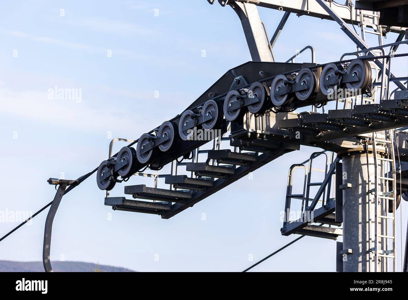 Details of the construction of a mountain chairlift. View of the rope ...