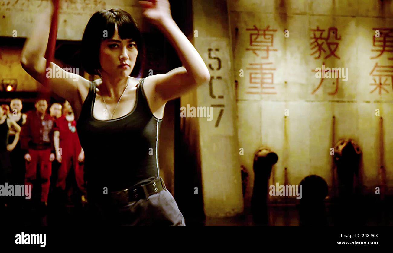 Los Angeles. CA.USA. Rinko Kikuchi in scene from the ©Warner Bros. Pictures  promo for the new movie: Pacific Rim (2013) Plot: When an alien attack  threatens the Earth's existence, giant robots piloted, image size:1300x839