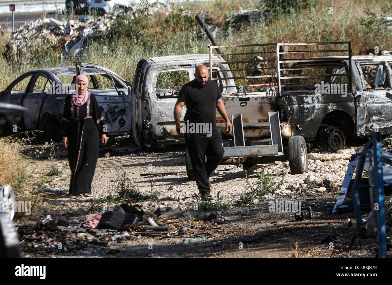 Al Laban Al Sharkiyeh, Palestine. 21st June, 2023. Palestinians inspect ...