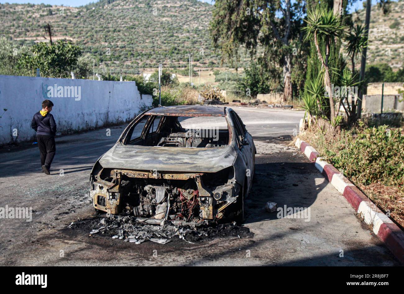 Al Laban Al Sharkiyeh, Palestine. 21st June, 2023. View of a burnt car ...