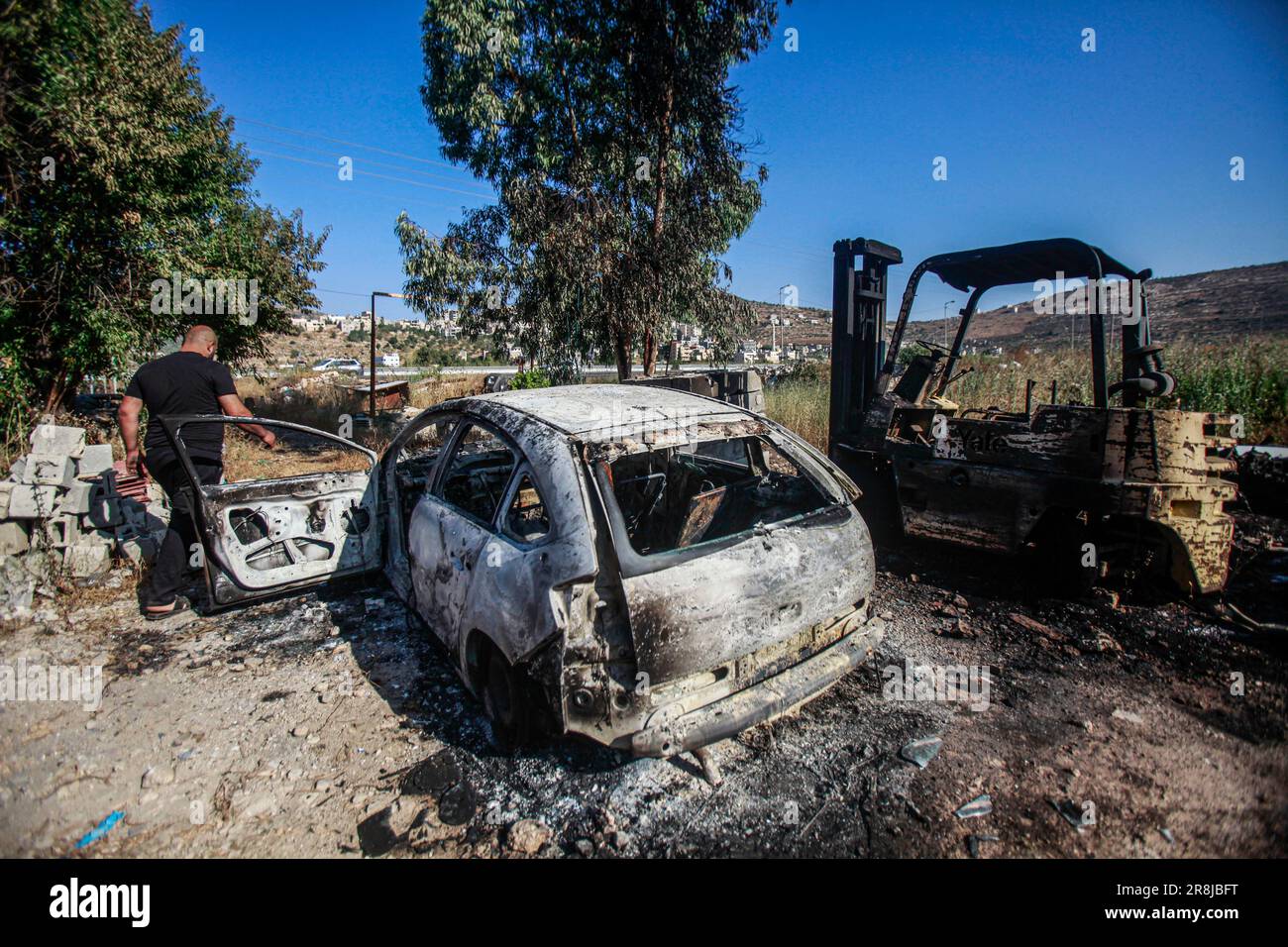 Al Laban Al Sharkiyeh, Palestine. 21st June, 2023. A Palestinian man ...