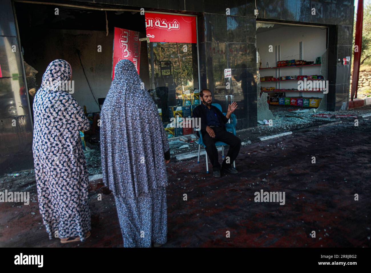 Al Laban Al Sharkiyeh, Palestine. 21st June, 2023. Palestinians inspect ...