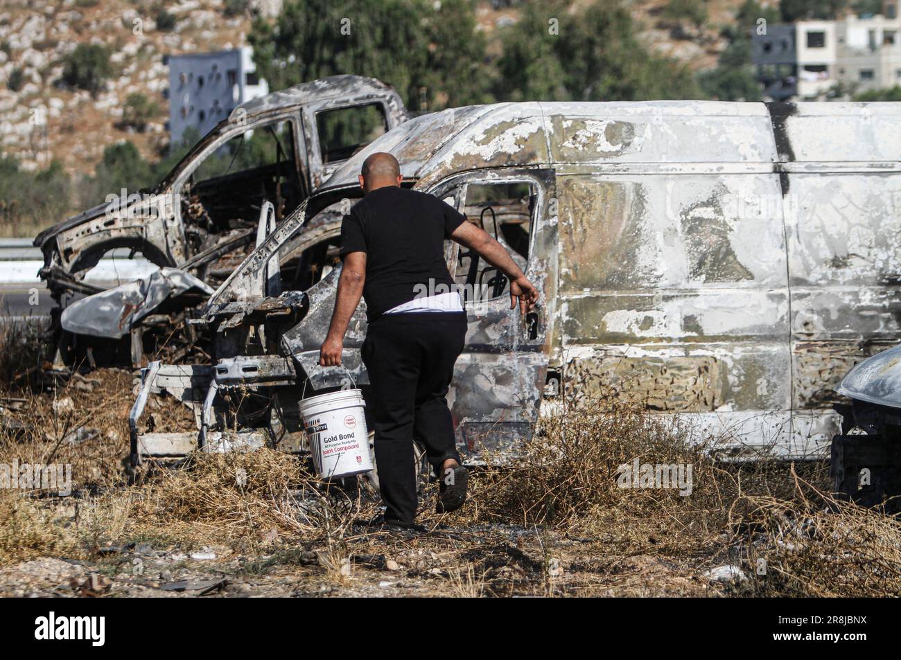 Al Laban Al Sharkiyeh, Palestine. 21st June, 2023. A Palestinian man ...