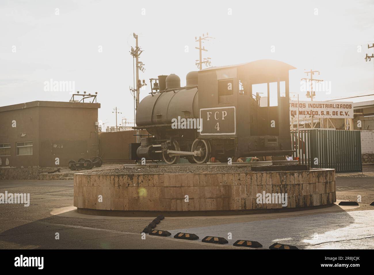 Old coal and steam train machine exhibited in the courtyards in ...