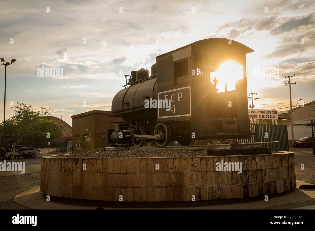 Old coal and steam train machine exhibited in the courtyards in ...