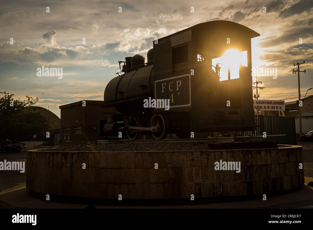 Old coal and steam train machine exhibited in the courtyards in ...