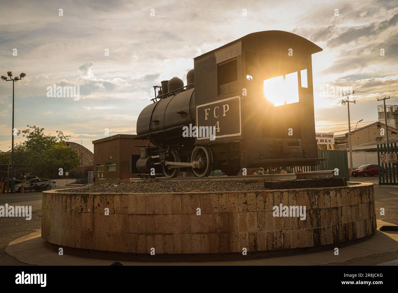 Old coal and steam train machine exhibited in the courtyards in ...