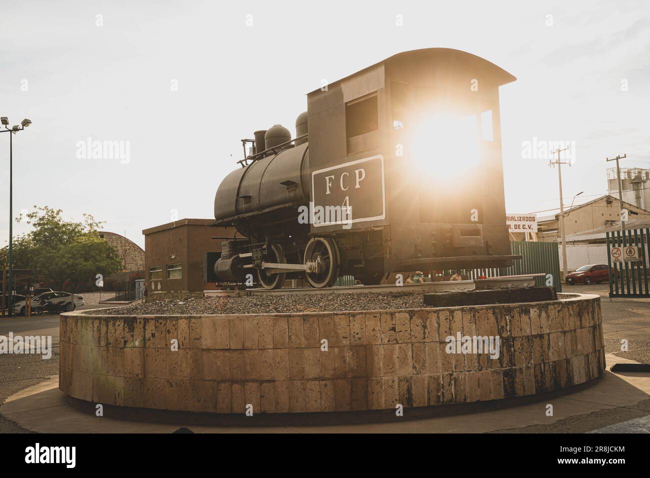 Old coal and steam train machine exhibited in the courtyards in ...