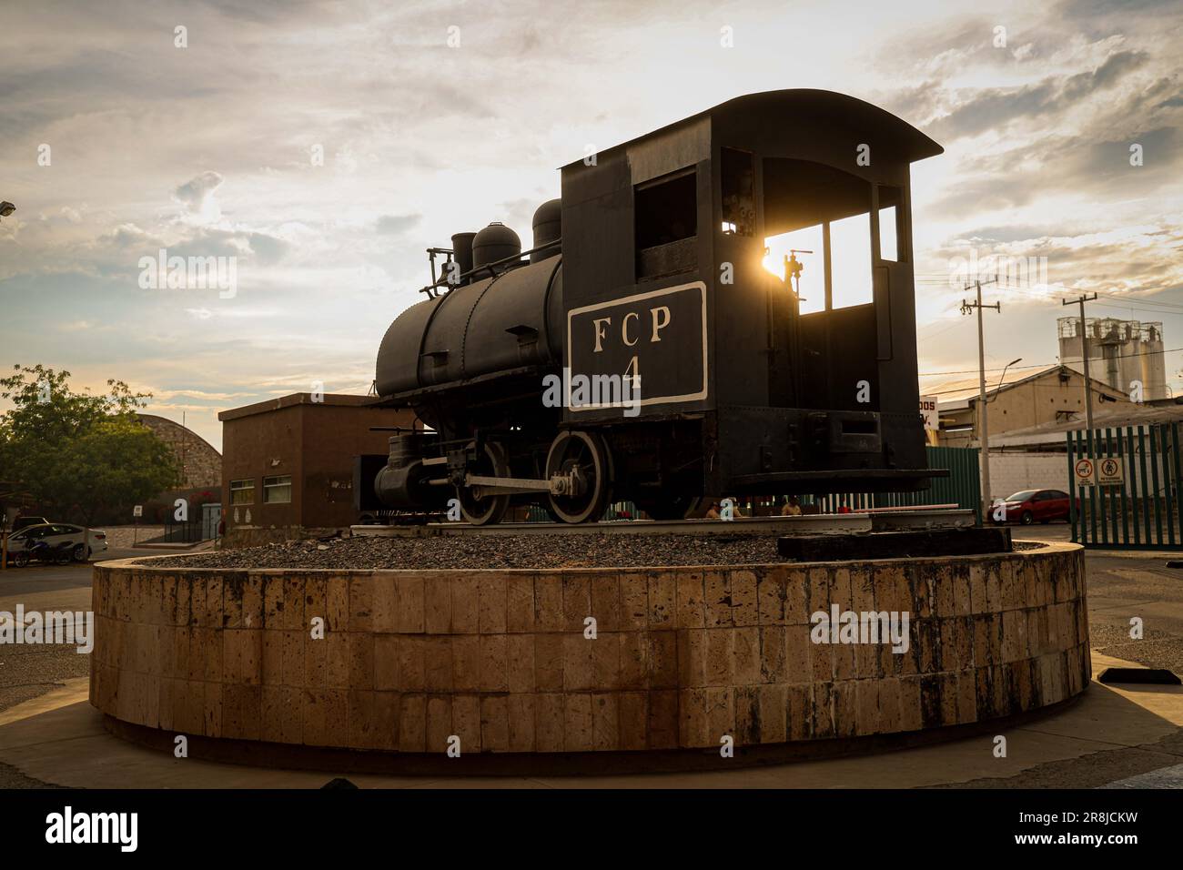Old coal and steam train machine exhibited in the courtyards in ...