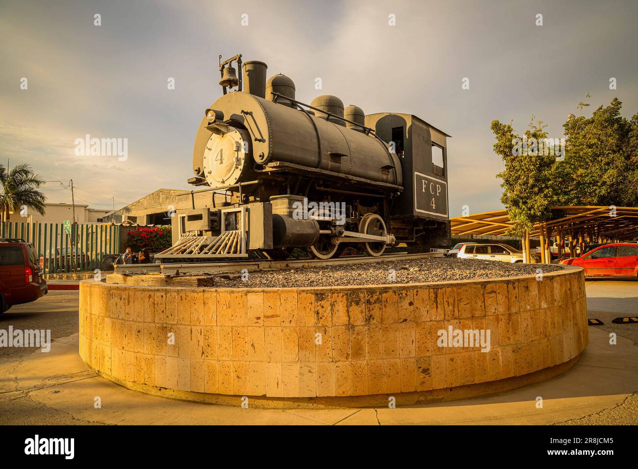Old coal and steam train machine exhibited in the courtyards in ...