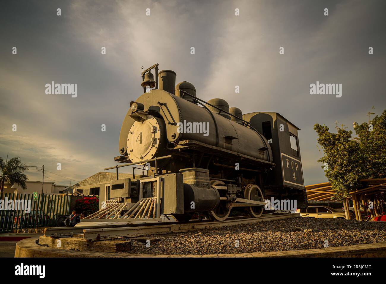 Old coal and steam train machine exhibited in the courtyards in ...