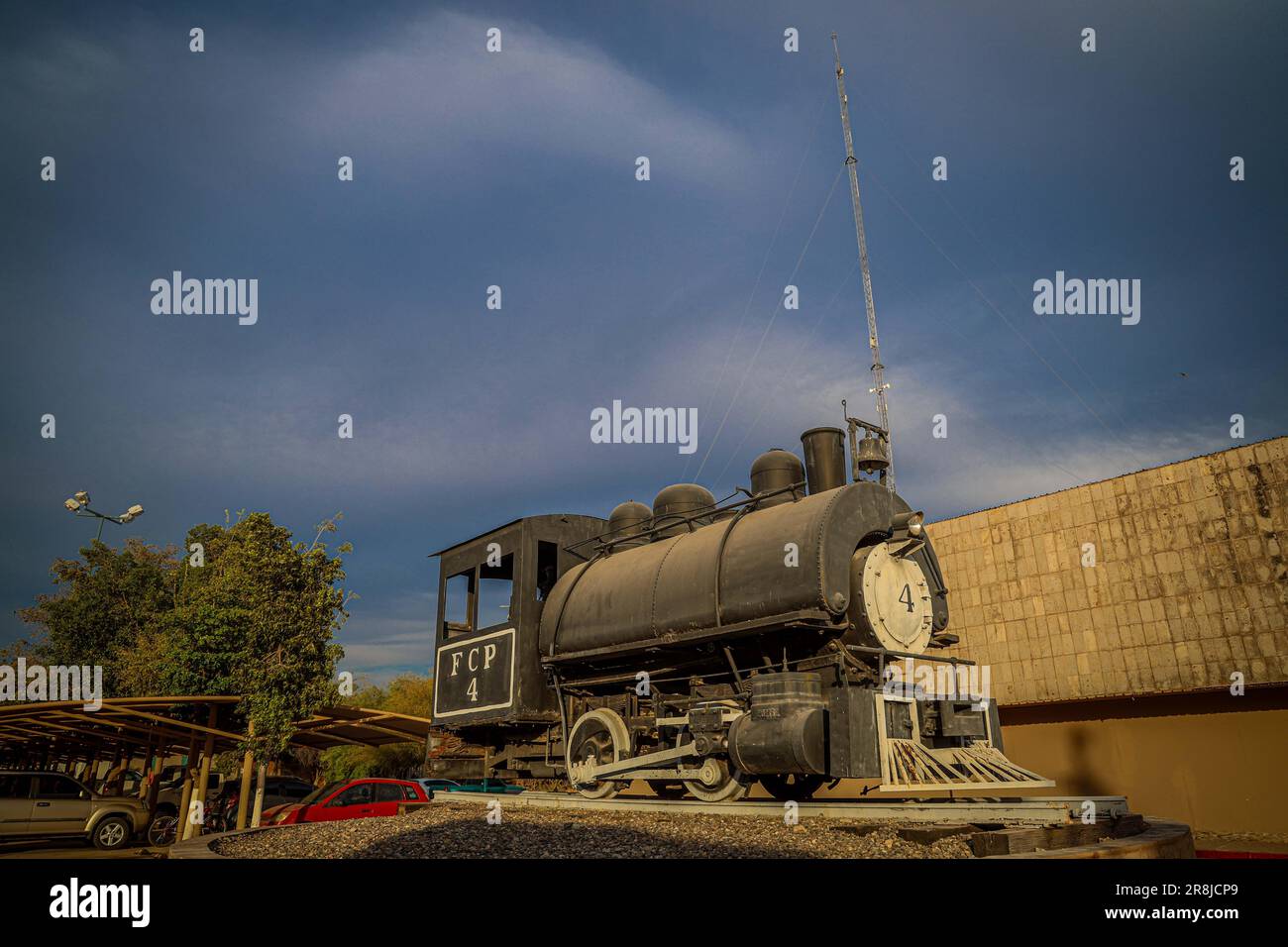 Old coal and steam train machine exhibited in the courtyards in ...