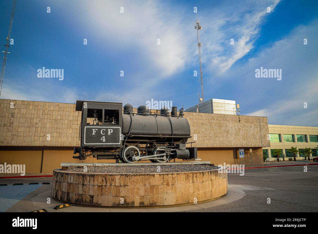 Old coal and steam train machine exhibited in the courtyards in ...
