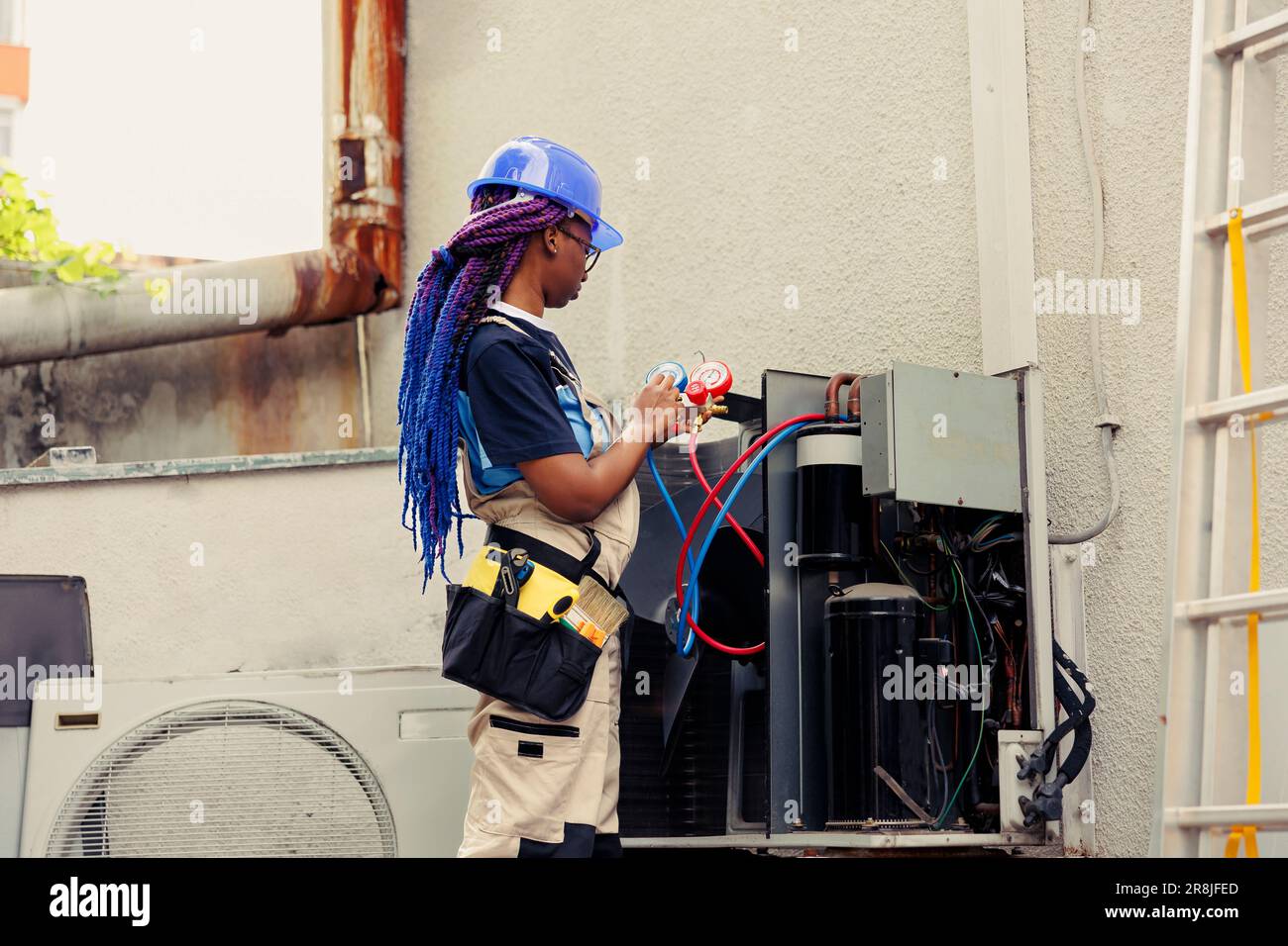 Competent mechanic starting routine condenser maintenance, assembling