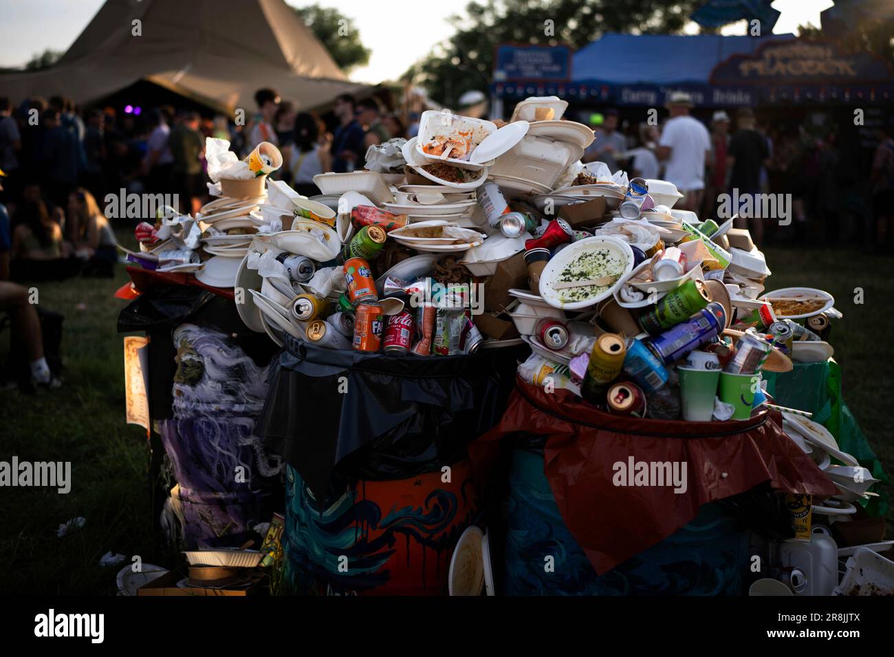 Rubbish stacked on refuse bins at the Glastonbury Festival in Worthy