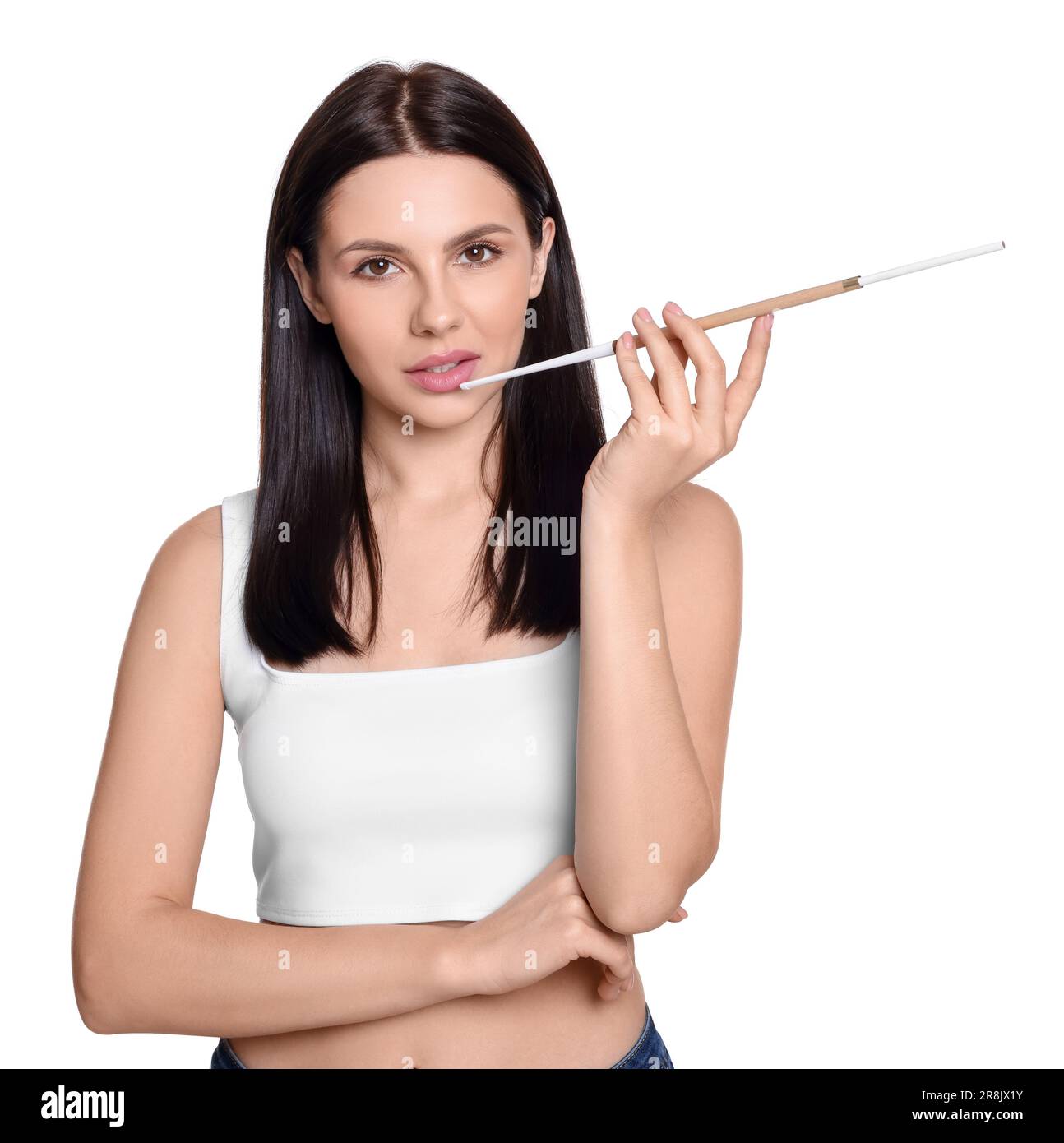 Woman using long cigarette holder for smoking isolated on white Stock Photo 