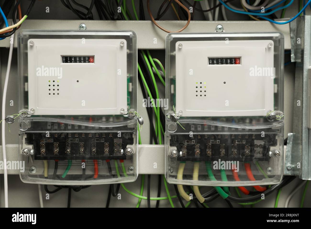 Electric meters and wires in fuse box Stock Photo Alamy