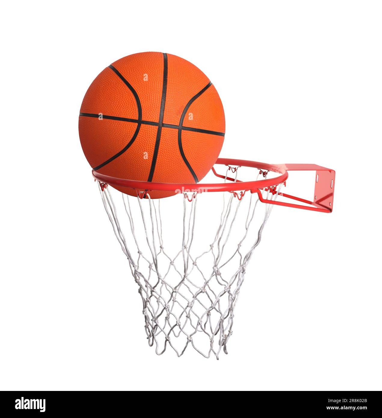 Basketball ball falling into hoop with net isolated on white Stock