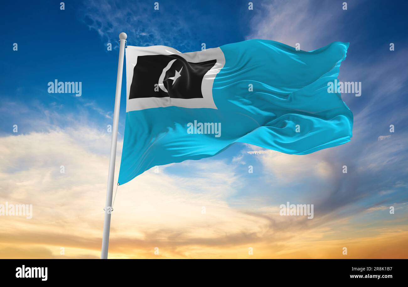 official flag of Dungun, Terengganu Malaysia at cloudy sky background on sunset, panoramic view. Malaysian travel and patriot concept. copy space for Stock Photo