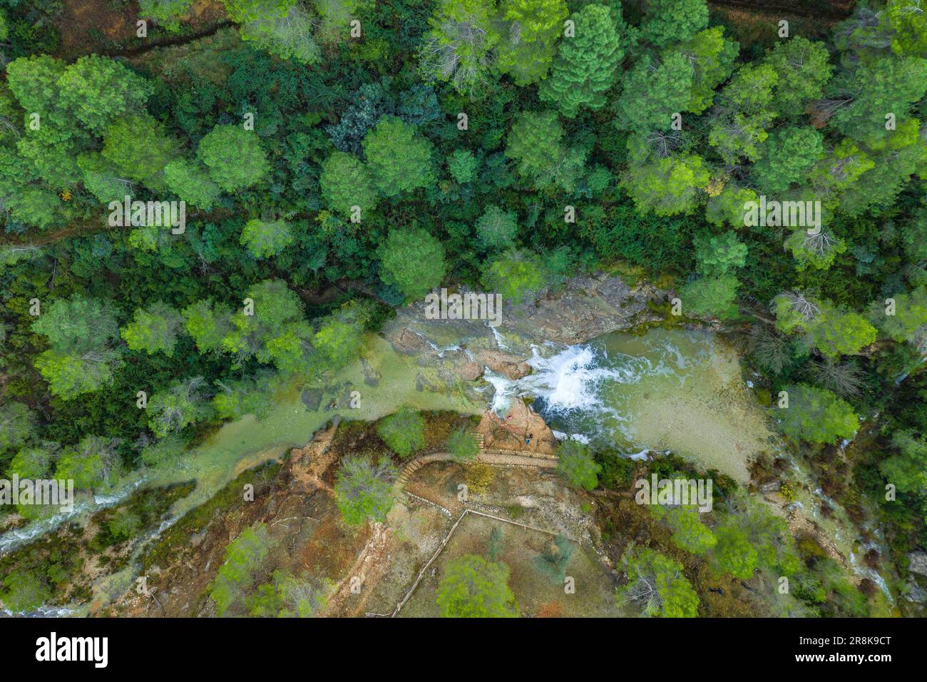 Zenithal aerial view of the Toll del Vidre in the Algars river, in the Els Ports / Los Puertos natural park, with a large flow after heavy rains Stock Photo