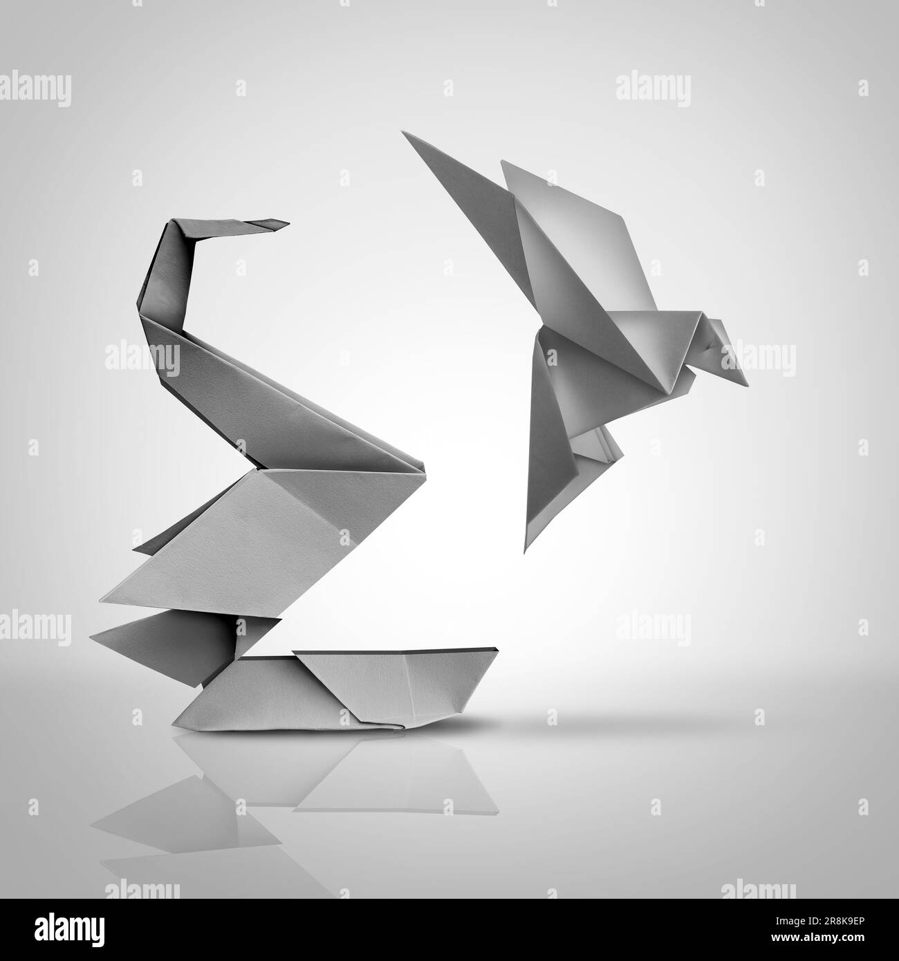 Next Level Growth and Accelerated Expansion or Changing for success as a leadership and business change with a paper swan turning into a flying bird. Stock Photo