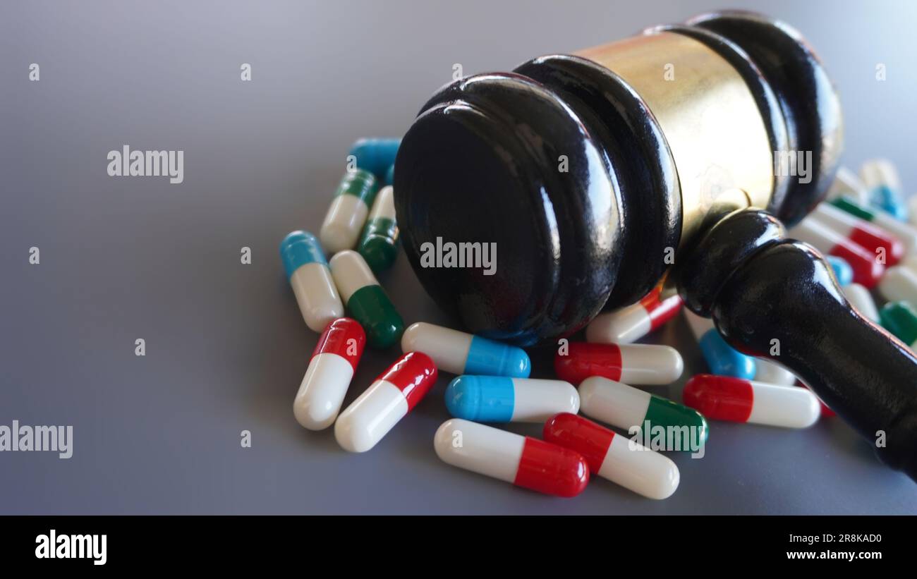 Judge gavel and pills with copy space. Medical law and drug law concept Stock Photo