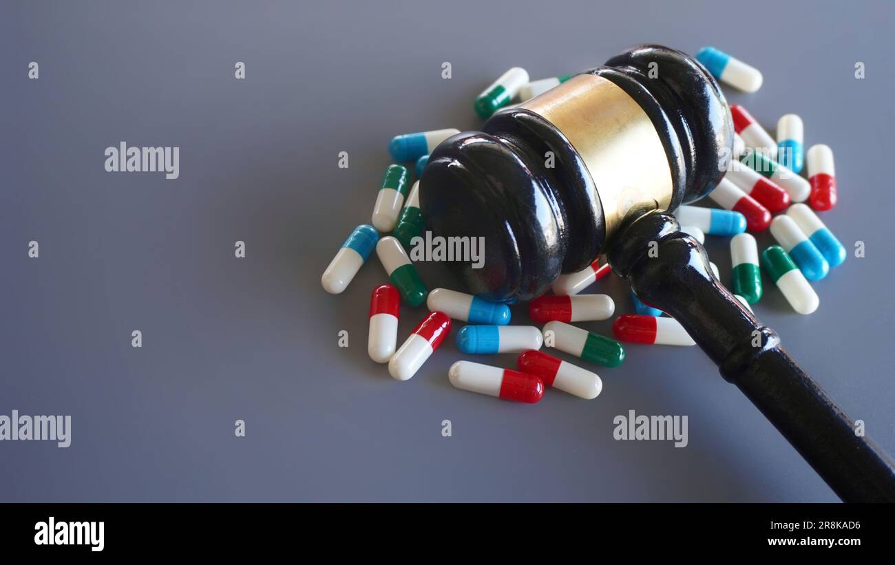Judge gavel and pills with copy space. Medical law and drug law concept Stock Photo