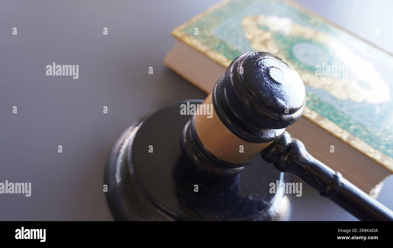 Gavel and Quran with copy space. Sharia or Islamic law concept Stock Photo