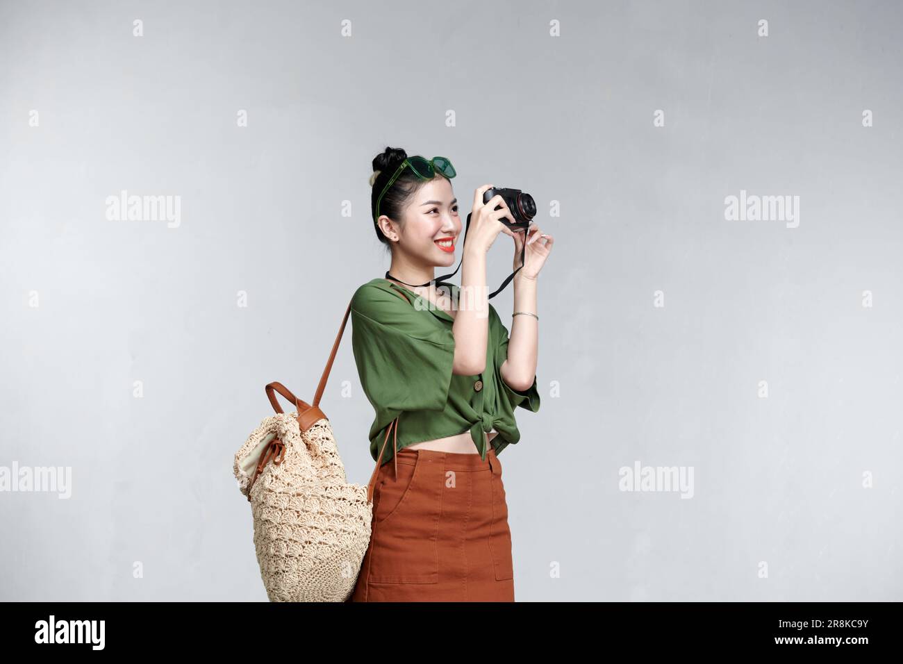 beautiful happiness young asian girl in casual dress traveling alone Stock Photo