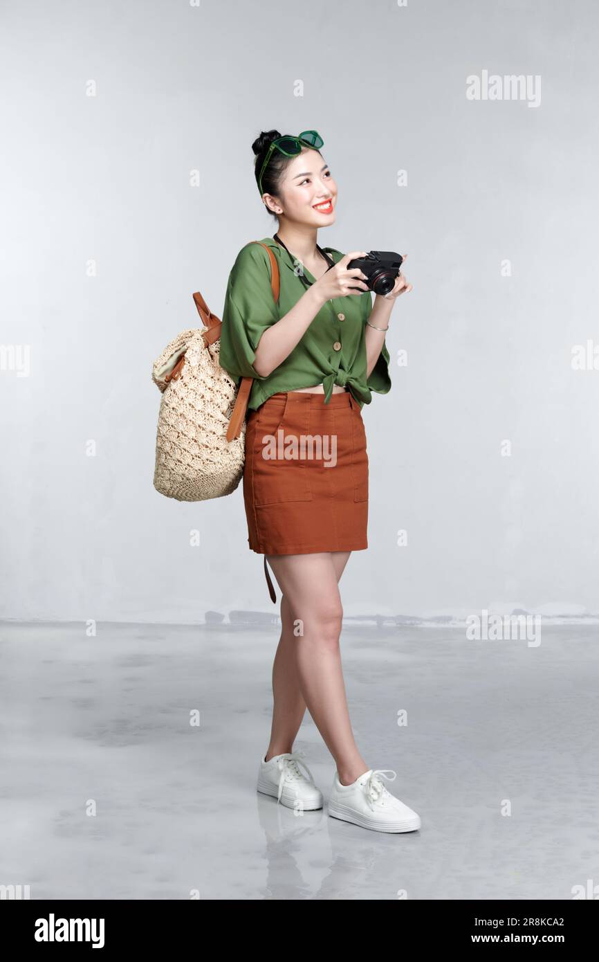 beautiful happiness young asian girl in casual dress traveling alone Stock Photo
