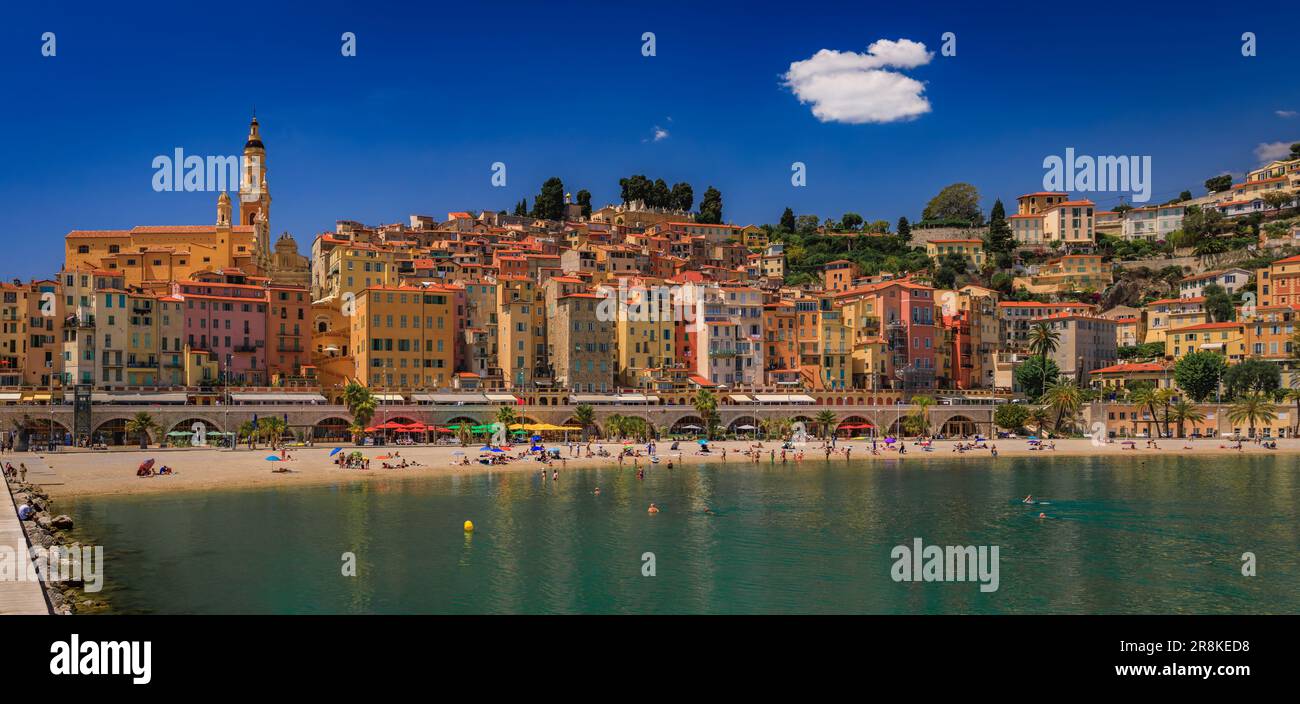 View of the colorful old town facades above the Mediterranean Sea in Menton on french Riviera, France on a sunny day Stock Photo