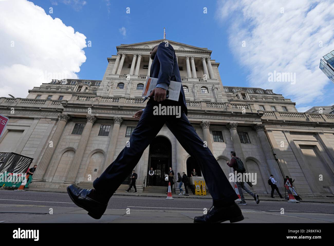 FILE - A Man Walks Past The Bank Of England, At The Financial District ...