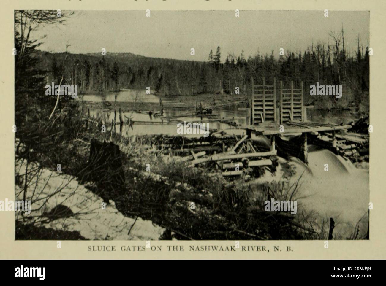 Sluice Gates on the Nashwaak River N. B. from the Article THE CANADIAN LUMBER INDUSTRY. by J. S. Robertson from The Engineering Magazine DEVOTED TO INDUSTRIAL PROGRESS Volume X October 1896 NEW YORK The Engineering Magazine Co Stock Photo