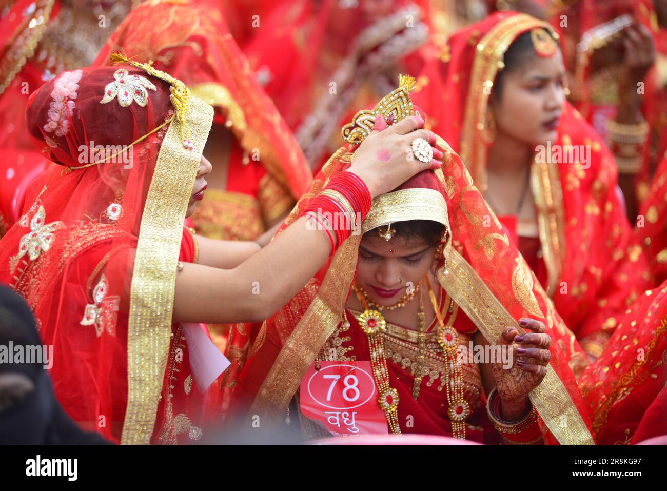 India, Madhya Pradesh, Jabalpur, June 22,2023 : Brides during the mass marriage ceremony organized under Mukhyamantri Kanya Vivah Yojana, in Jabalpur on June 22, 2023. Former state president of BJP Yuva Morcha and senior BJP leader Dhiraj Pateria along with his workers participated in this programme. Photo by - Uma Shankar MISHRA Stock Photo