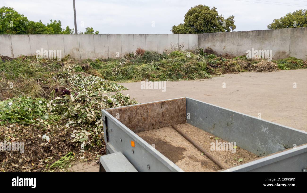 garden plant green waste landfill with private trailer car in council