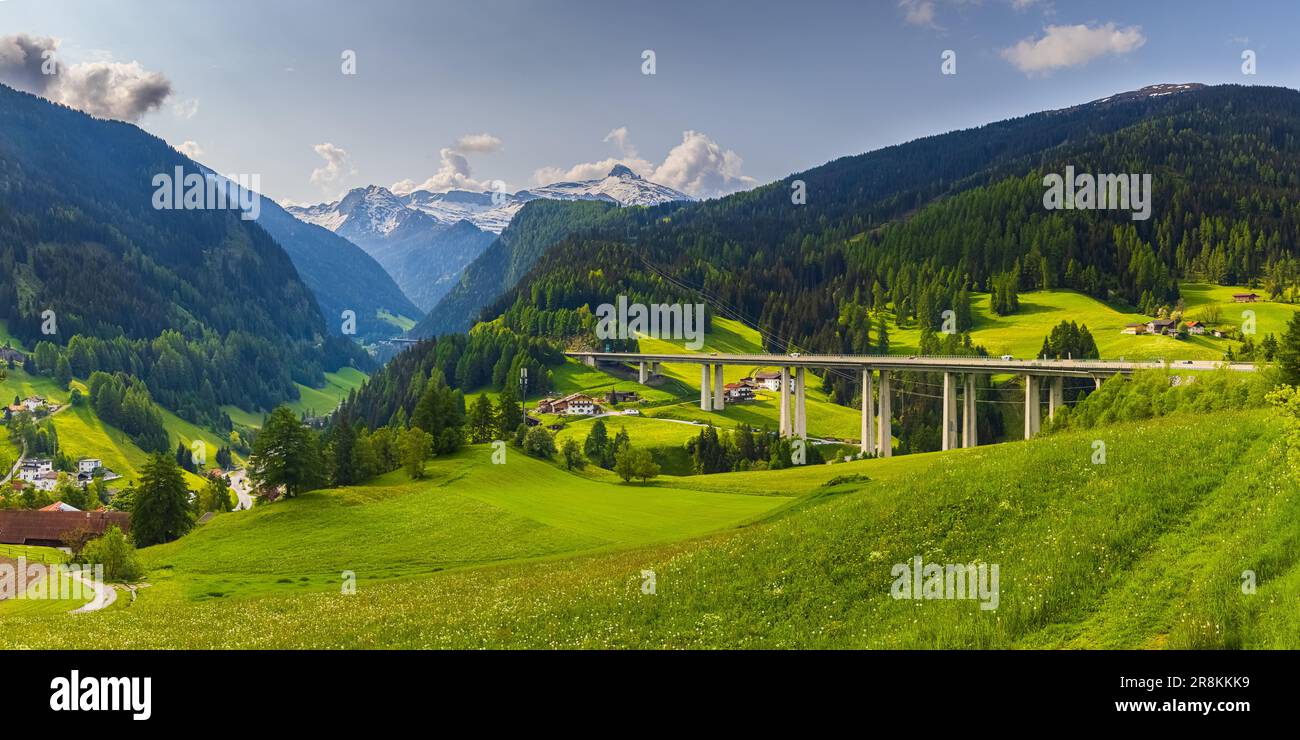 A 2:1 panoramic image from the Brenner Pass, shortly Brenner; (Italian: Passo del Brennero), a mountain pass through the Alps which forms the border b Stock Photo