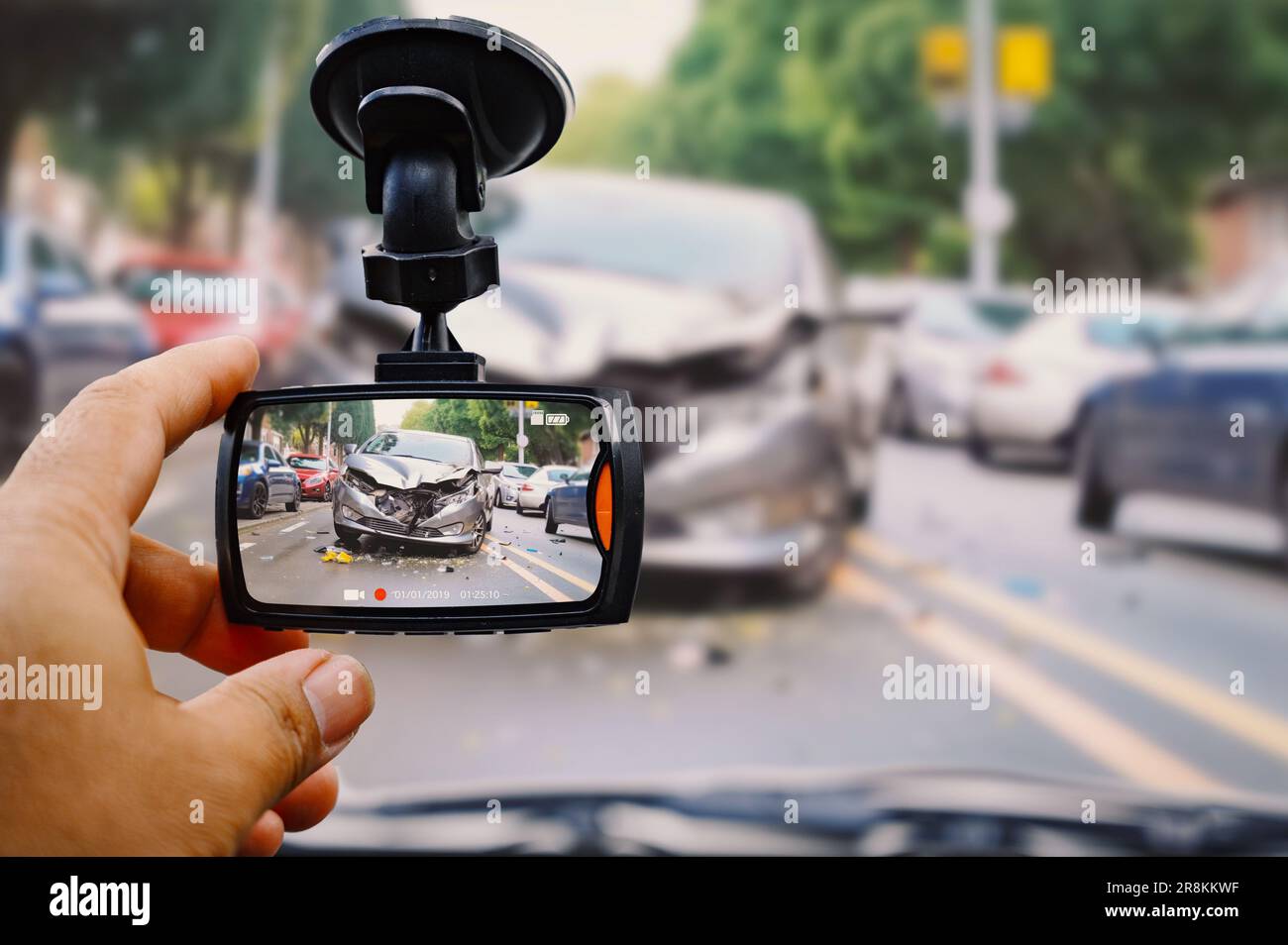 The human hand is touching camera on the car for check image car